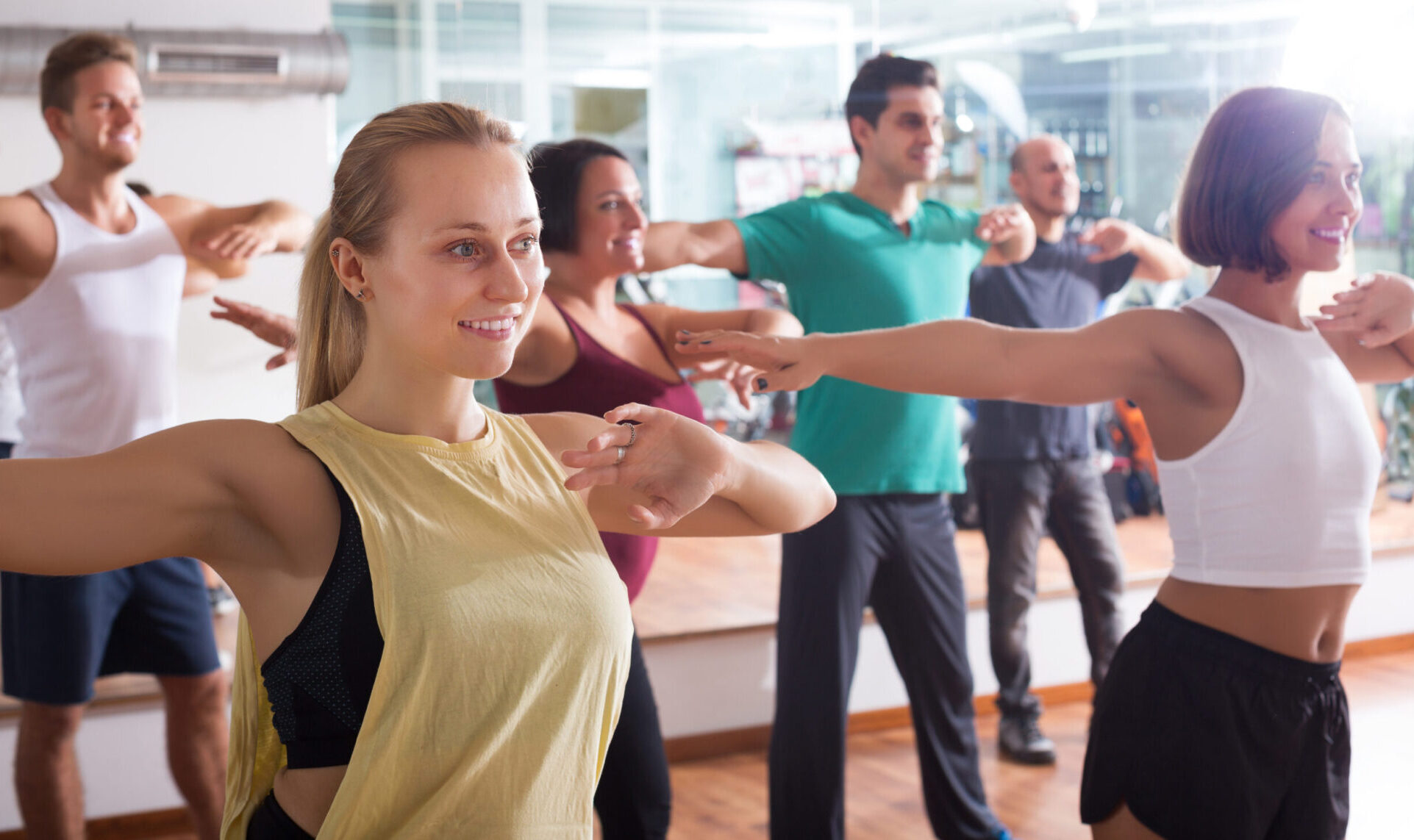Men and ladies dancing zumba